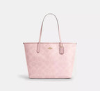 Coach City Tote Bag
In Signature Canvas Pink