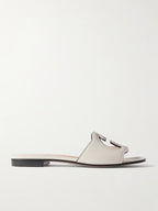 GUCCI
Cutout leather slides White