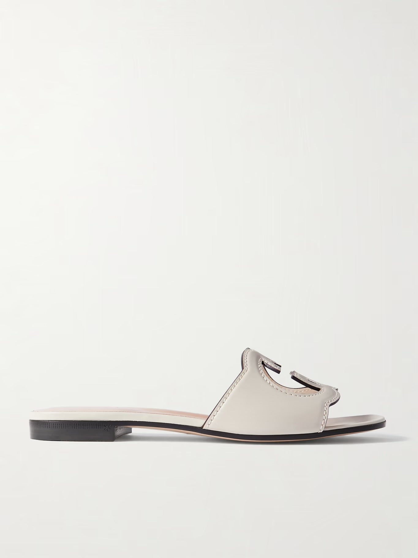 GUCCI
Cutout leather slides White