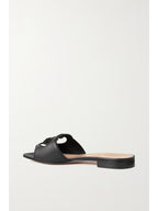 GUCCI
Cutout leather slides