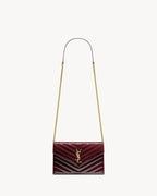 CASSANDRE ENVELOPE CHAIN WALLET IN PATENT LEATHER RED