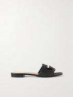 GUCCI
Cutout leather slides