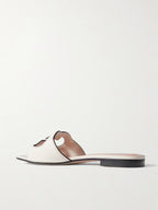 GUCCI
Cutout leather slides White