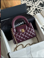 CHANEL
Small Kelly Burgundy
