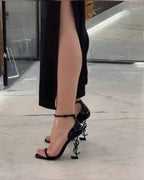 Saint Laurent Opyum black-tone YSL monogram heel