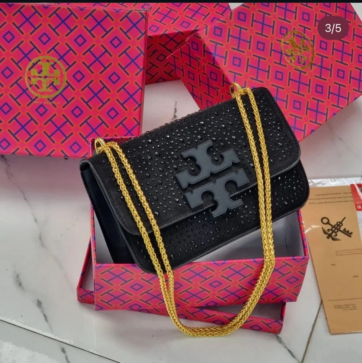 Tory Burch Eleanor bag in a black embellished design